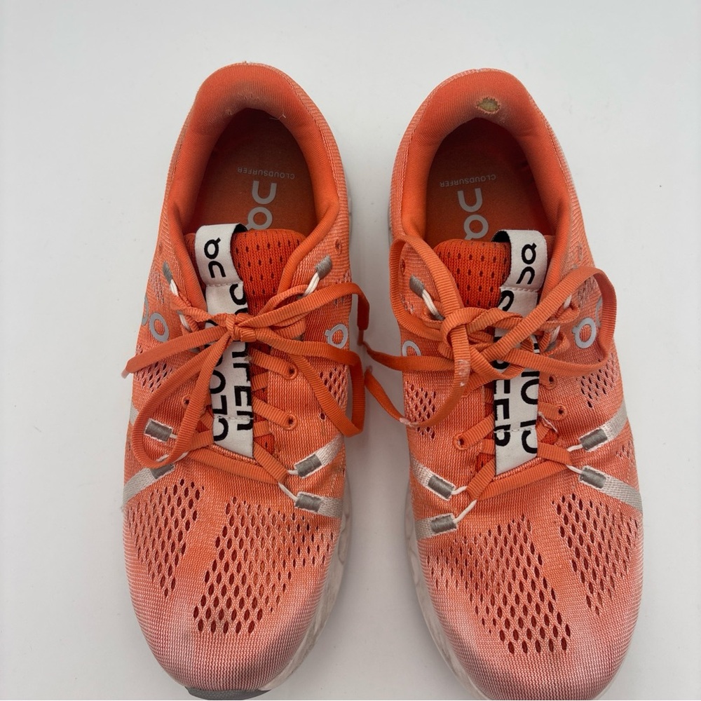 On Running Women's Athletic Shoes in Vibrant‎ Orange and Silver